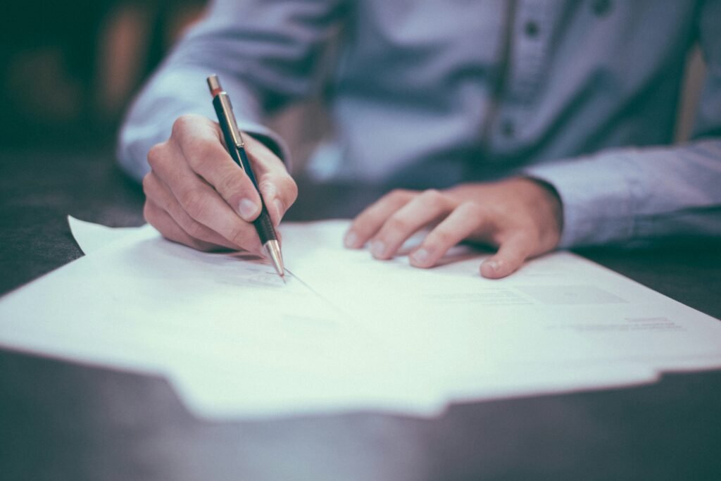 https://unsplash.com/photos/man-writing-on-paper-OQMZwNd3ThU
