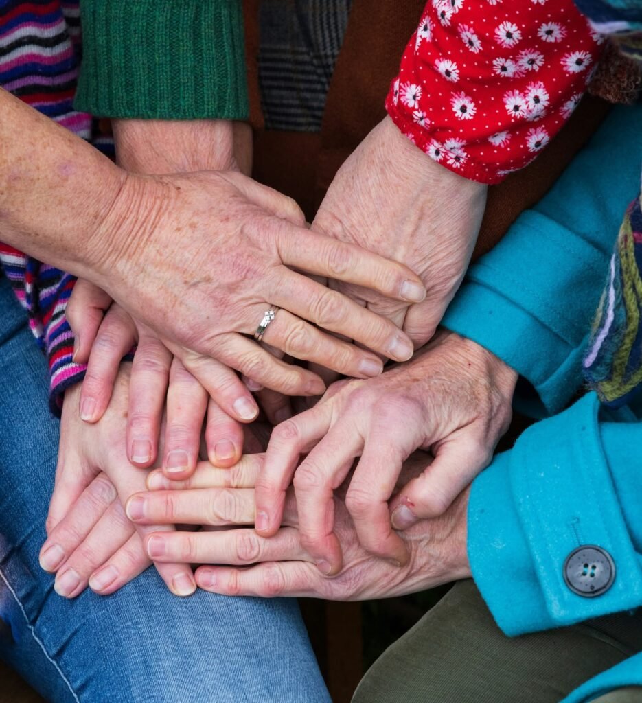 MANY HANDS TOGETHER CROPPED - filipp-romanovski-_o0vyQ6HcFo-unsplash