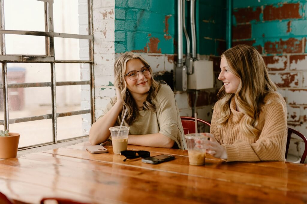 Two young women talking